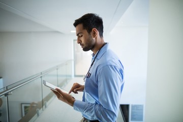 Fototapeta premium Doctor using digital tablet