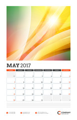 Wall Calendar Planner Template for 2017 Year. May. Vector Design Template with Abstract Background. Week starts Sunday. Portrait Orientation