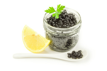 Black caviar, luxurious delicacy isolated on a white background cutout