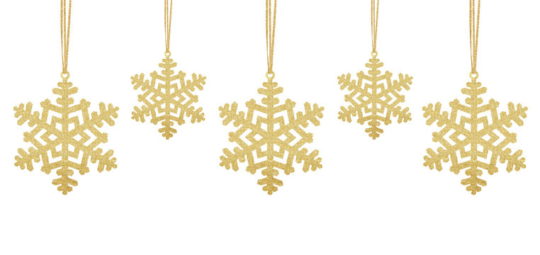 Golden Christmas snowflakes on ribbon isolated on white backgrou