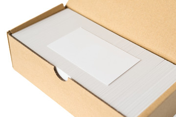 side view box of business cards with a blank one good for text & logo stands on top on white  including clipping path