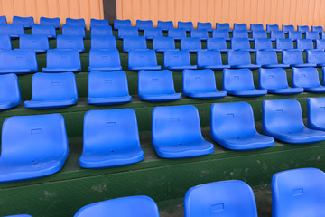 lines of blue stadium seats