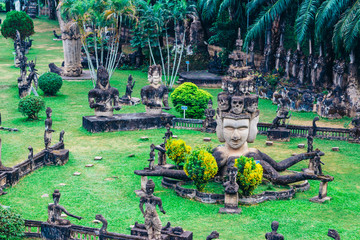 Buddha park in Vientiane, Laos. The landmark of ancient Buddhist stone statues and religious figures
