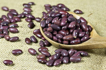 Red beans and wooden spoon