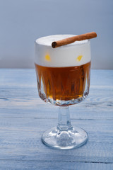 Cream soda cocktail closeup on wood