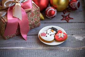 Christmas Holiday Background. Gingerbread, Christmas  decorations and gift box 