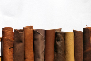 leather brown roll isolated on white background 4