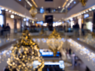 Time of Christmas sales, shopping center, festively decorated. blurred background