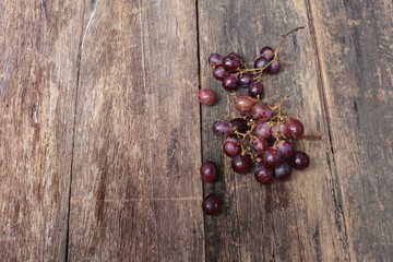 Grape red fresh on wooden table background