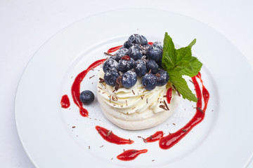 Meringue cake Pavlova with blueberry
