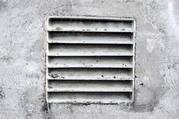 Old concrete wall with vent