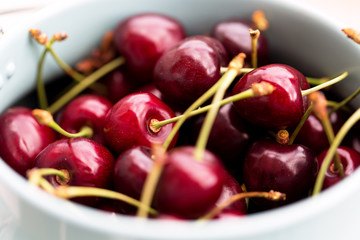 Ripe sweet cherries in a busket, selective focus