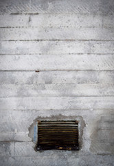 Old concrete wall with vent