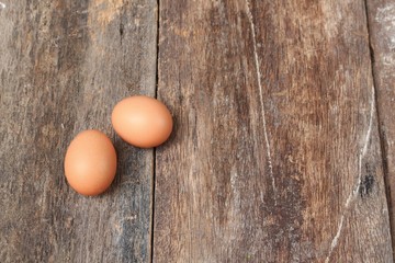  egg on wood background. Top view