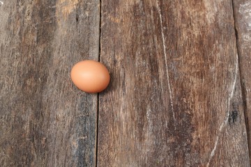  egg on wood background. Top view