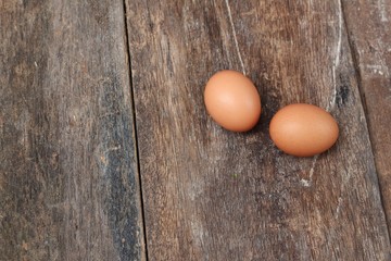  egg on wood background. Top view