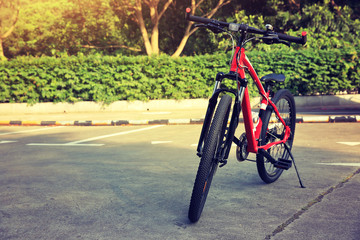 closeup of mountain bike at parking lot