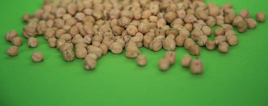 scattered peas on a green background