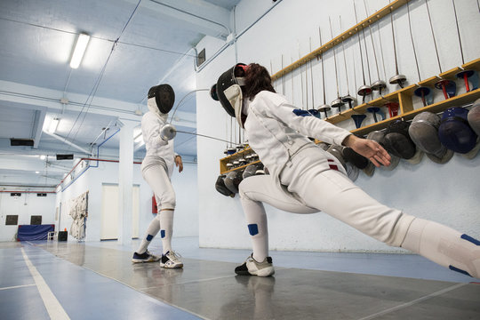 Female fencers during a fencing match