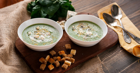 fresh and tasty green cream soup of spinach and broccoli