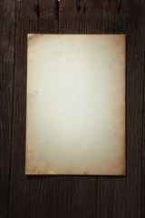 paper on wood background