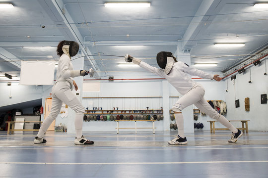 Female fencers during a fencing match