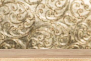 metallic gold blur background with selected focus empty wood tab