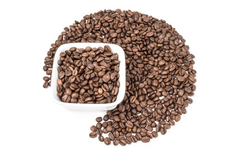 Pile of roasted coffee beans isolated on a white background cutout