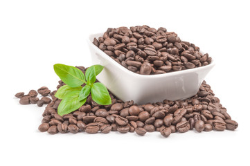 Brown coffee beans on a white background. Clipping path