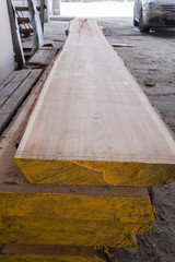 Stacked on top of each other larch slabs. Perspective view.