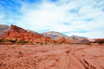 Impressions of the Canyon Quebrada de las Conchas with walls of rock displaying a multitude of red hues close to Cafayate in Chile, South America