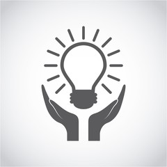 Fototapeta premium hands and bulb light icon over white background. vector illustraiton