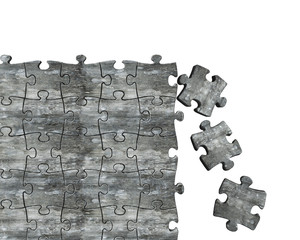 Concrete puzzles wall with some pieces falling