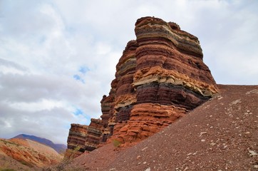 Impressions of the Canyon Quebrada de las Conchas with walls of rock displaying a multitude of red hues close to Cafayate in Chile, South America