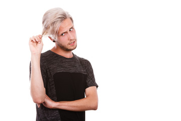 Young man with damaged dry hair