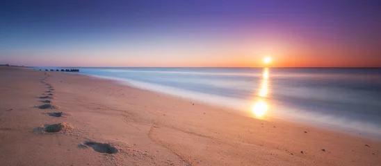 Fotobehang Voetstappen langs het strand © Michael