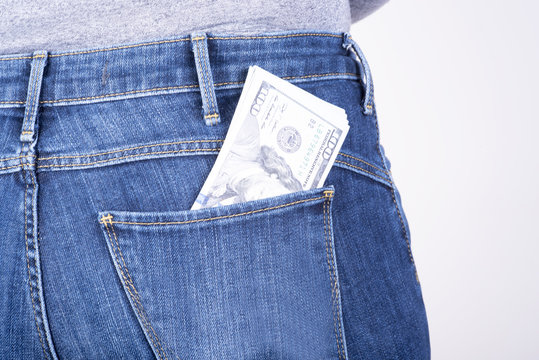dollars sticking out of his pants pocket