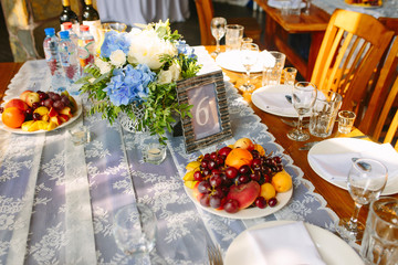 served table with a tablet with a number