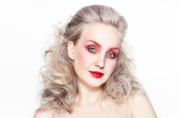 Vintage style portrait of young beautiful woman with powder long curly hair and fancy red make-up