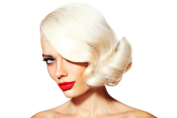 Portrait of young beautiful platinum blonde tanned woman with vintage hairdo and red lipstick over...