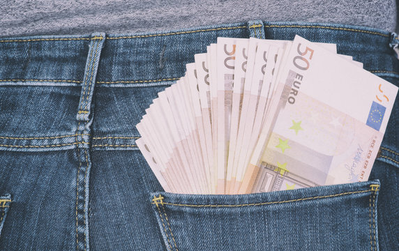 euro sticking out of his pants pocket
