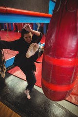 Female karate player practicing boxing 