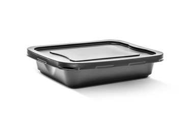 blank packaging black plastic food case isolated on white backgr