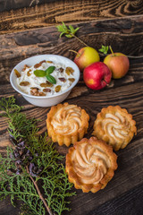 Cheesecake on the rustic wooden background