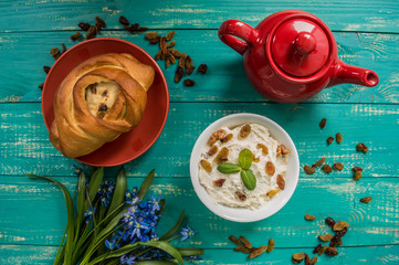 Cheesecake on the turquoise wooden background