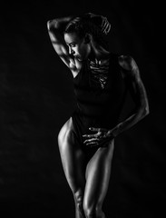 Fitness Model on black background 
