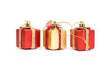 The gift boxes red & gold color on white background (isolated), Christmas holiday and party decoration.