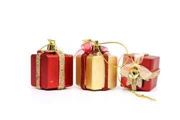 The gift boxes red & gold color on white background (isolated), Christmas holiday and party decoration.