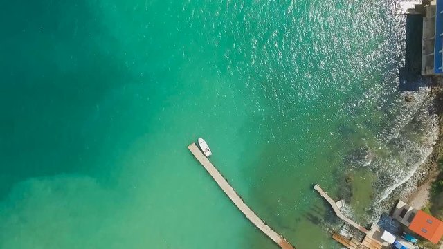 Boat moored at the pier on the island