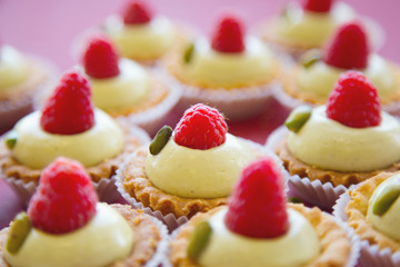 Homemade round tartlets with fresh raspberry